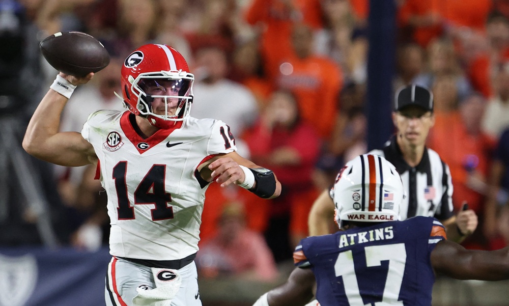 How much is Georgia favored to beat Auburn by to open the week?